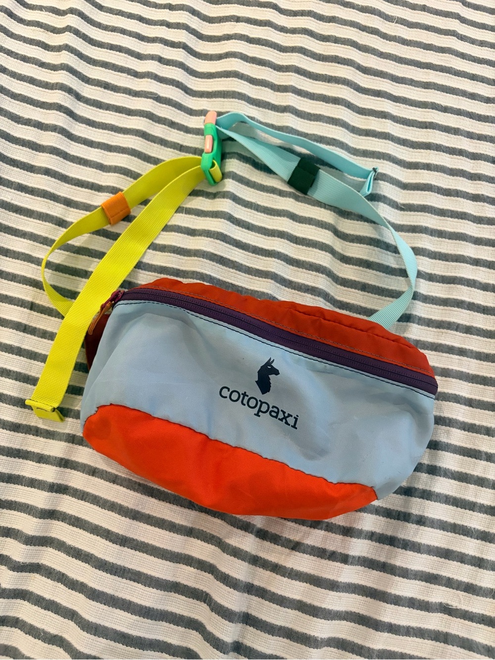 cotopaxi Light Blue & Orange Kids Waist Pack with Neon Strap